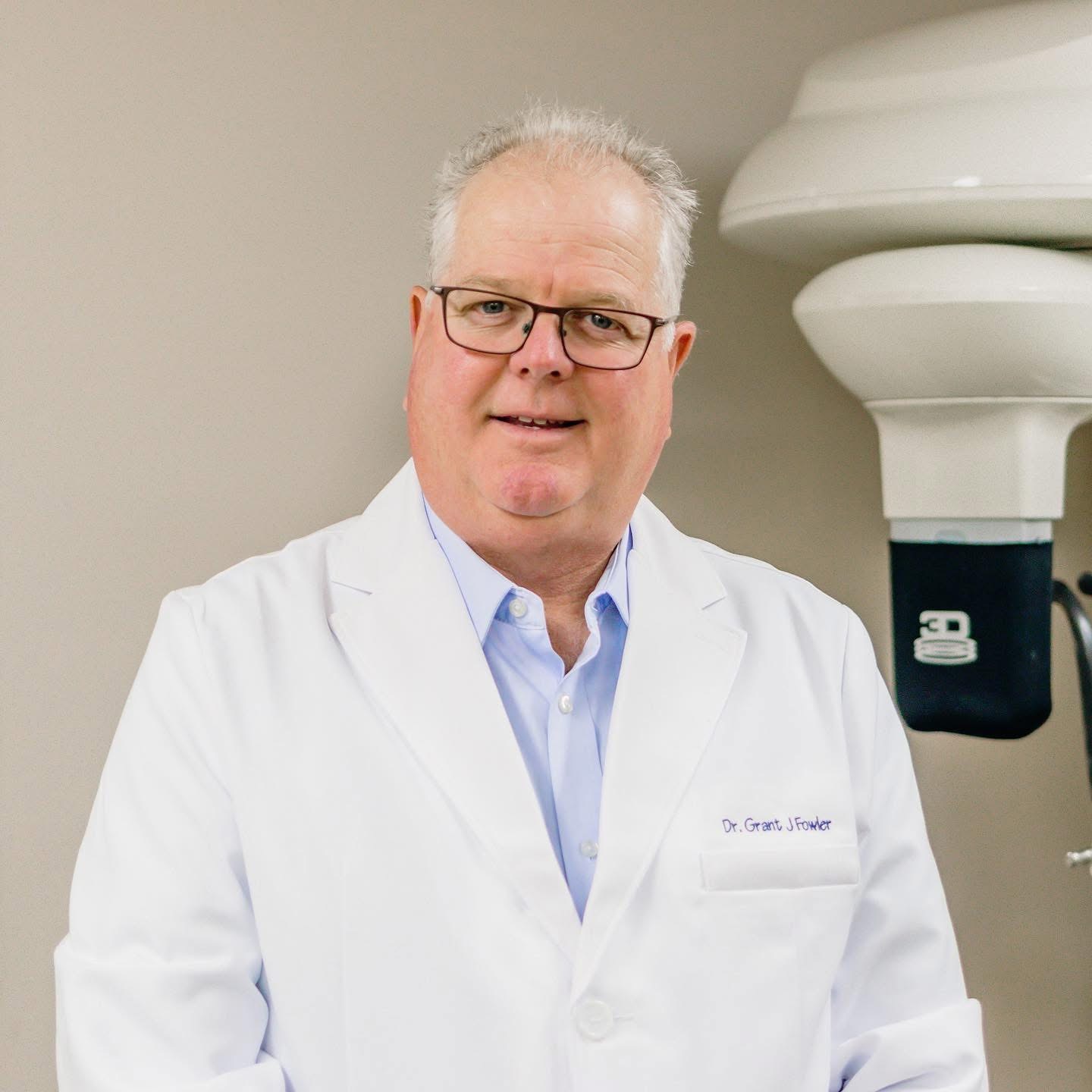 Dr. Grant Fowler in a white coat